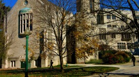 Woodburn Hall building in Collegiate Gothic style on the Indiana University Bloomington campus during autumn