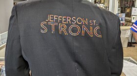 A suit has the inscription of "Jefferson St. Strong"