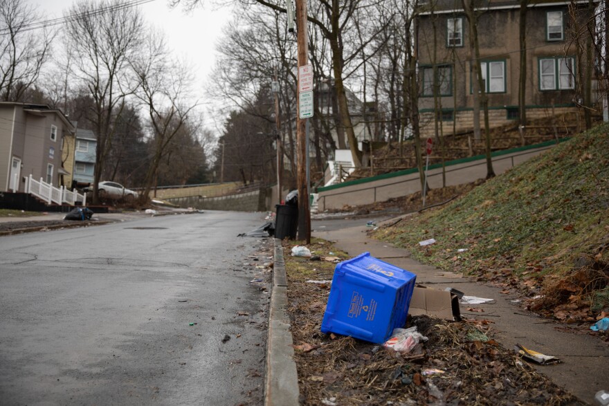 Trash bins sit outside houses on S Beech St. Syracuse, NY, Mar. 7, 2022.