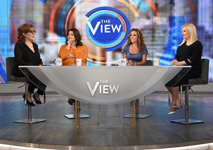 Ana Navarro (center left) and Sunny Hostin (center right) appear on <em>The View</em> on Aug. 2, 2019. The two were pulled live from the TV show on Friday, just before Vice President Harris was scheduled to join them onstage for an interview.