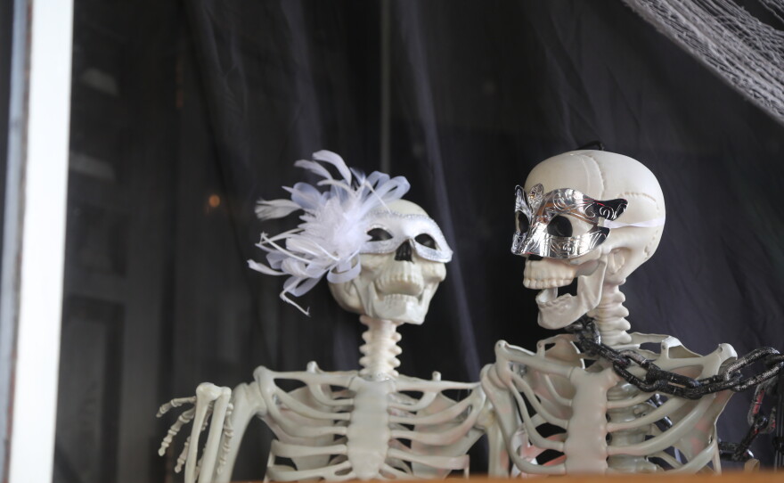 A vignette in the front window of the Historic Baker Building for the Día de Muertos Masquerade Ball on Oct. 30 and 31.