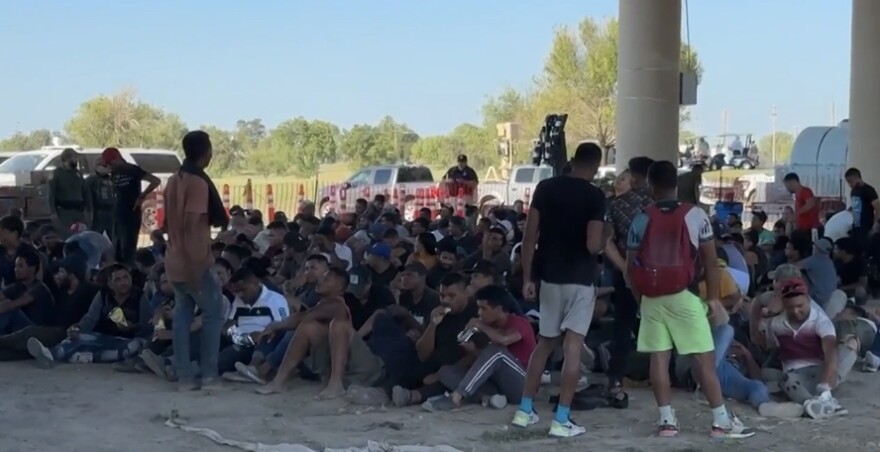 Migrants staged in Eagle Pass TX for procession by Border Patrol.