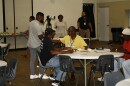 Fort Myers Community Redevelopment Agency input meeting attendee and contributor Jason Teeters, left, greets community members on Sept. 30 at the Quality of Life Center in Dunbar where neighbors and friends gather to provide their input on McCollum Hall's future.