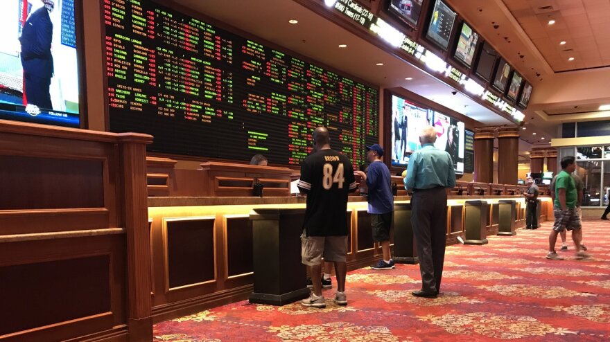 People place bets at the Sports Book at the South Point Hotel and Casino in Las Vegas. Missouri legislators are expected to take up legalizing sports betting in 2020. 