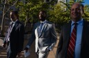 St. Louis Sheriff Alfred Montgomery, center, walks alongside his lawyers Bill Margolis, left, and Justin Gelfand, right, after being indicted on five federal felonies outside the Thomas F. Eagleton U.S. Courthouse on Thursday, Oct. 9, 2025, in downtown St. Louis.