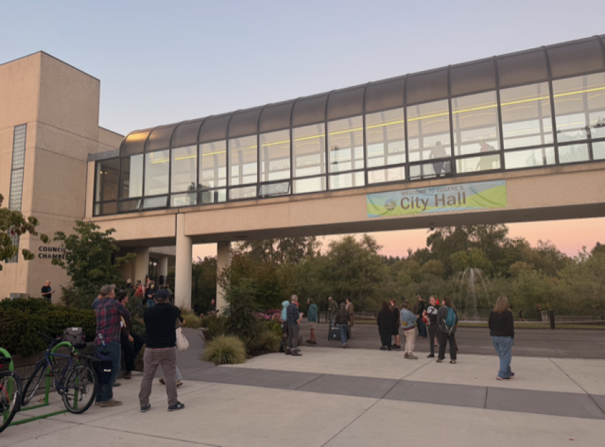 People gather outside Eugene City Hall on Monday, Sept. 14, after the council chambers reached capacity. The meeting included a 90-minute public comment section where speakers called for restrictions on data center development.