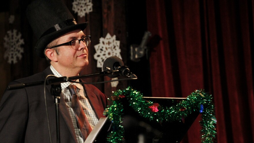 Puzzle Guru Ebeneezer Scrooge (played by Will Hines) on the Ask Me Another holiday special at the Bell House in Brooklyn, New York.