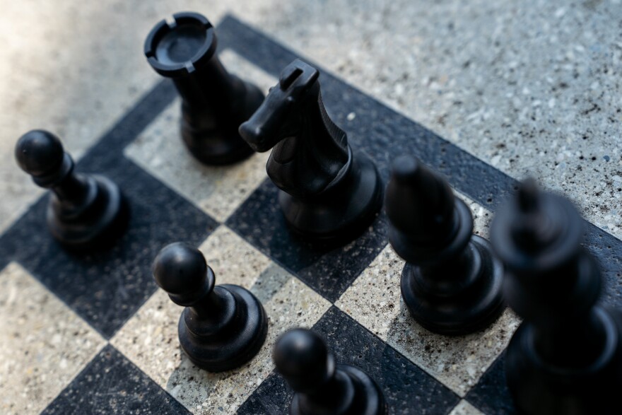 Chess pieces sit on an open-air table on Thursday, Aug. 17, 2023, in Grand Center.