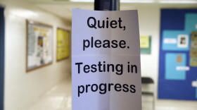 In this photo taken Jan. 17, 2016, a sign is seen at the entrance to a hall for a college test preparation class at Holton Arms School. (Alex Brandon/AP)