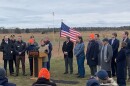 Governor Maura Healey (at the podium) announced that alpha-gal syndrome will become a reportable condition in Massachusetts at the Frances A. Crane Wildlife Management Area in North Falmouth. Massachusetts Public Health Commissioner Dr. Robbie Goldstein (leftmost person standing) spoke about the importance of collecting data on the emerging condition.