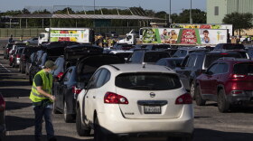 Lines of cars queued for a Central Texas Food Bank distribution at the Toney Burger Center in south Austin during the coronavirus pandemic. 
