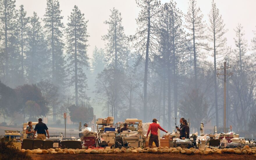 Search and rescue teams scramble to get patients and medical devices to safety as the Camp Fire cuts a fiery path through Paradise.