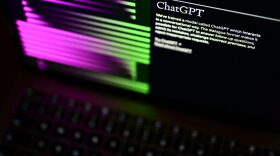 A photo taken in Manta, near Turin, shows a computer screen with the home page of the artificial intelligence OpenAI web site, displaying its chatGPT robot.