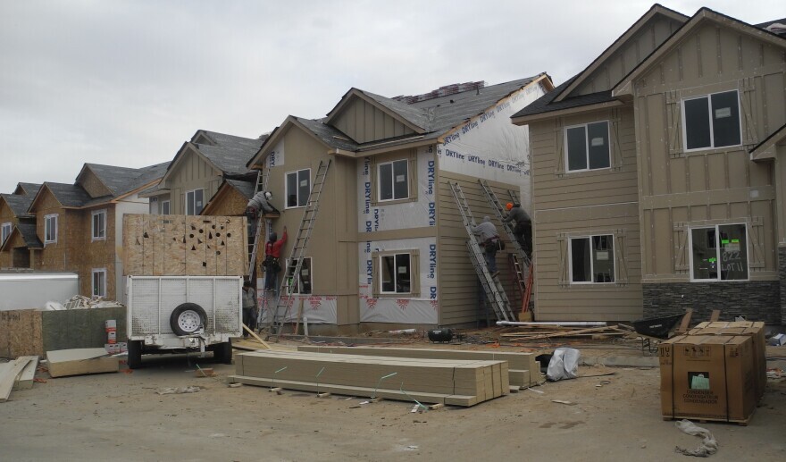 Beige condo units under construction in Boise.