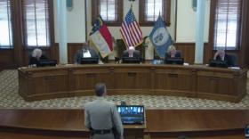 Commissioners listened to Sheriff Ed McMahon detail problems with the homeless population in front of the downtown library.