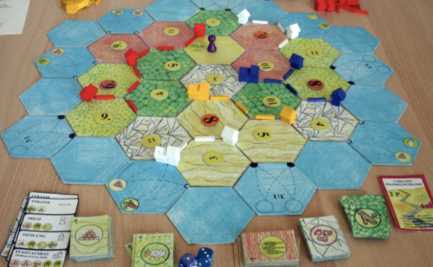 A 1994 test version of The Settlers of Catan before it was released a year later in Germany. The game was an instant hit. Today, Catan has sold more than 32 million units and is one of the bestselling board games of all time.