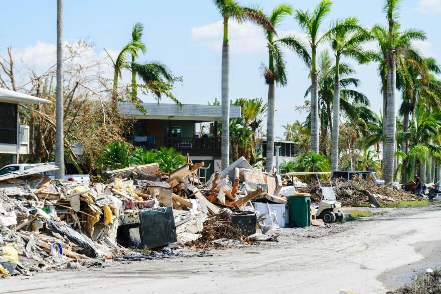 Debris-strewn streets in Everglades City a week after Hurricane Irma