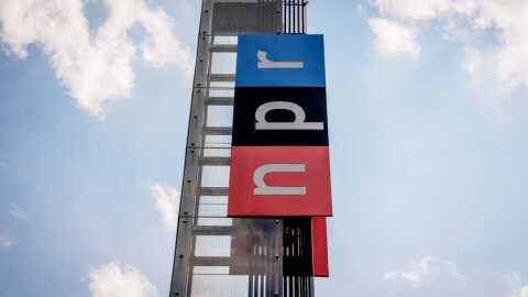 WASHINGTON, DC - JULY 22: View of the sign outside National Public Radio headquarters on July 22, 2025 in Washington, DC. Edith Chapin, NPR's editor-in-chief and acting chief content officer, has announced she will step down later this year following congressional funding cuts. (Photo by Andrew Harnik/Getty Images)