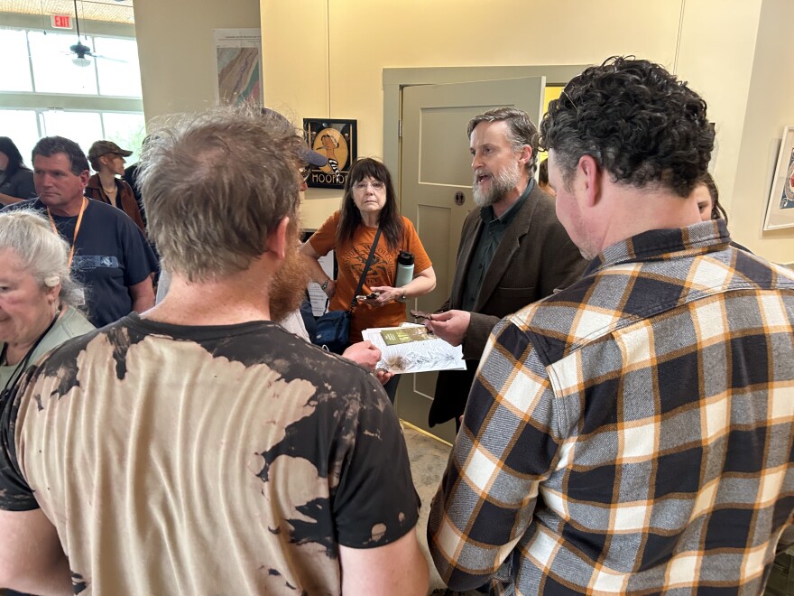 Bruch Reed, the chief operating officer of the North American Mycological Association, helps ID mushrooms after a short hike in early March at Quarry Gardens in Schuyler.