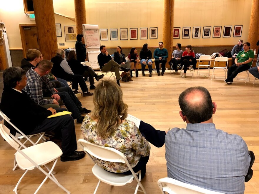 People in a large room.