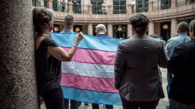  People held up a transgender flag at a protest last year at the Texas Capitol in Austin.