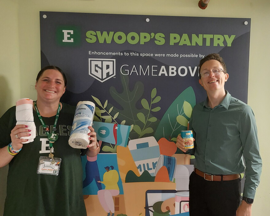 Swoop's Food Pantry Director Ben Roberts-Widdison (right) and Graduate Assistant Emily Bryson at Swoop's Food Pantry.