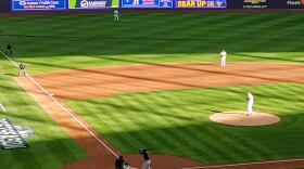 Corbin Burnes, of the Milwaukee Brewers, prepares to throw a pitch against the Atlanta Braves, during the first inning of Friday evening's 2-1 Brewers' win.