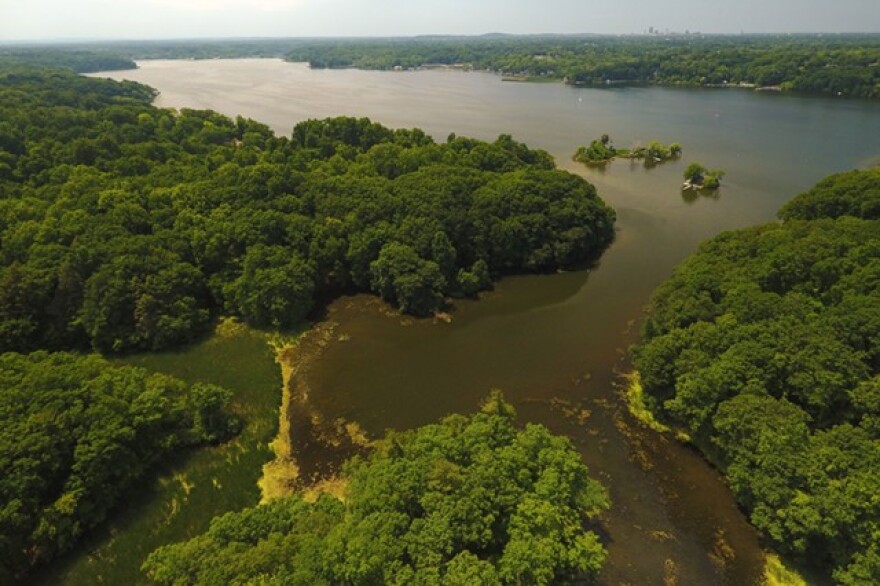 An aerial shot of Irondequoit Bay and its adjacent Devil's Cove Park.