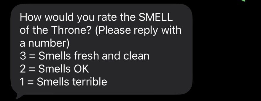 A screenshot of a text message. The text says "How would you rate the SMELL of the Throne? (please reply with a number) 3 = Smells fresh and clean 2 = Smells OK 1 = Smells terrible" 