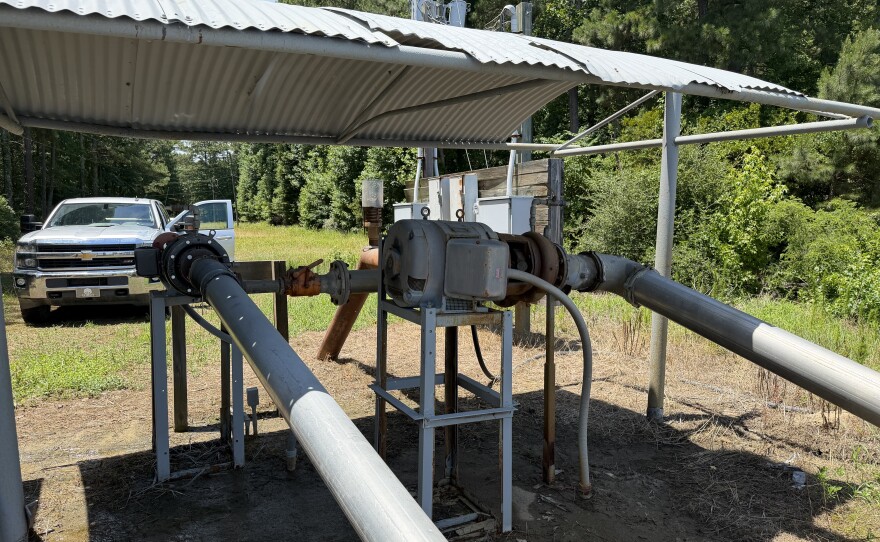 These pumps are part of Norman Perry's irrigation system, pictured on Wednesday, June 24, 2026. White pipes to the right connect to the Chowan River, while the copper pipe toward the middle back goes underground and connects to pivots on Perry's farm.