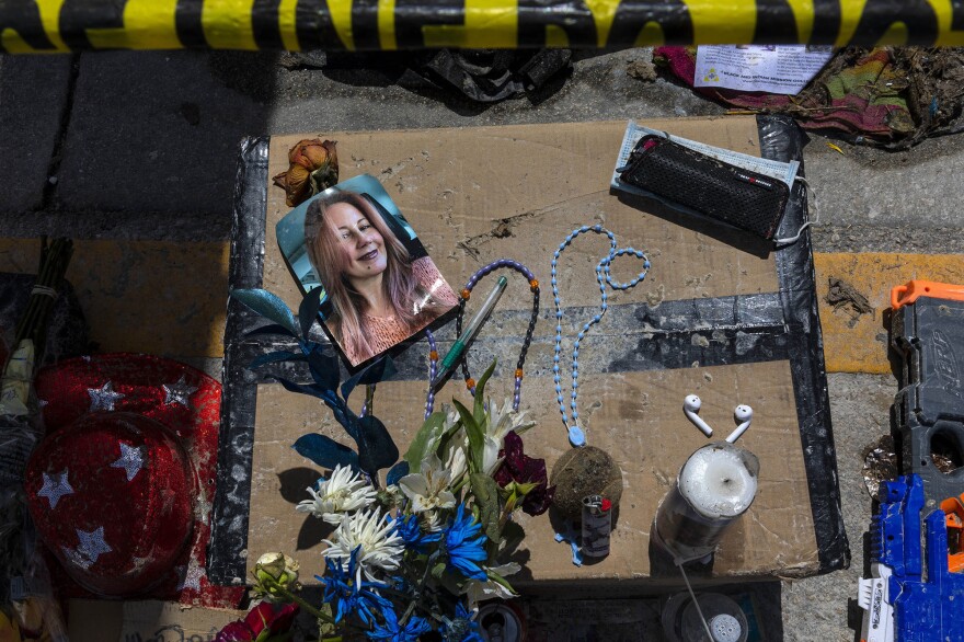 A memorial contains personal items of some of the missing from the collapsed Champlain Towers South in Surfside, Fla.