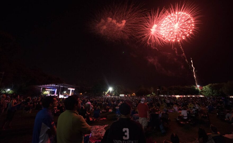 After the field lights dimmed at 9:30, a melody of American patriotic songs performed by the Gainesville Community Band heralded the start of the pyrotechnics. (Will England/WUFT News)