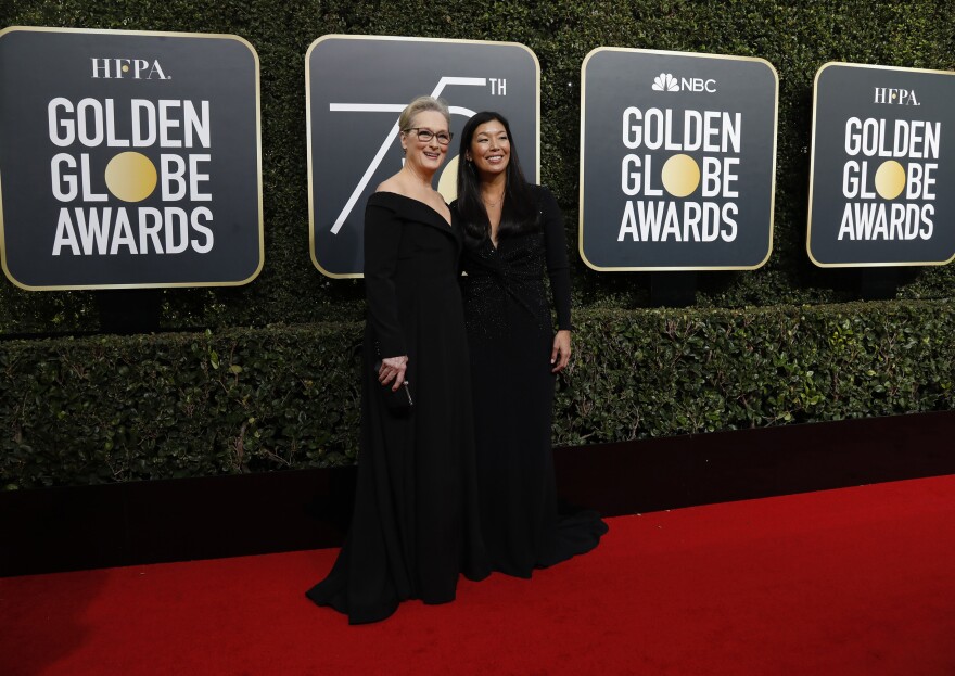 Actress Meryl Streep, left, and the director of the National Domestic Workers Alliance, Ai-jen Poo qrrive at 5th Golden Globe Awards