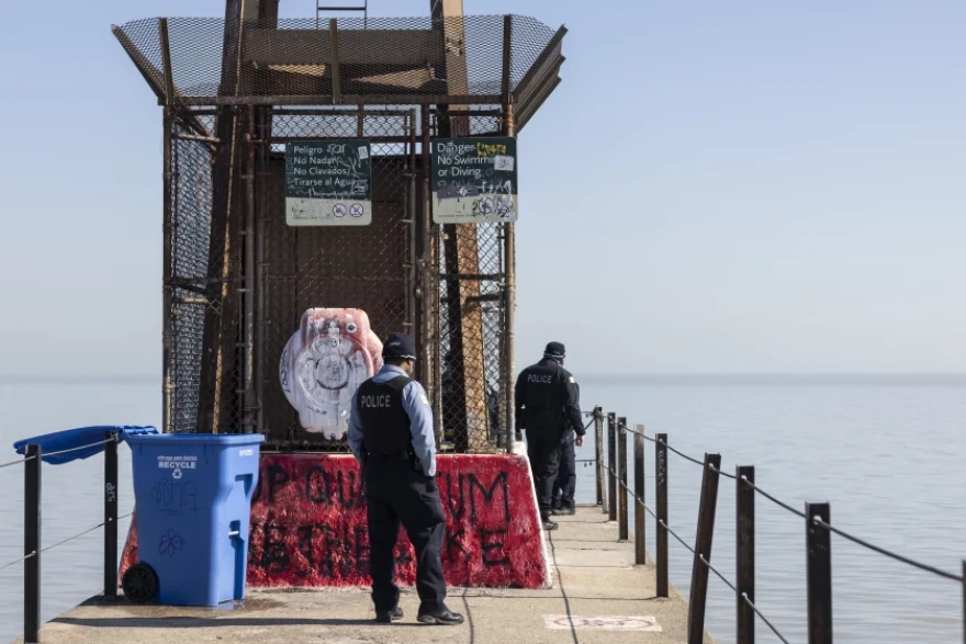 Chicago Police Department officers investigate on the pier at Tobey Prinz Beach after 18-year-old Loyola University student Sheridan Gorman was shot to death on Thursday.