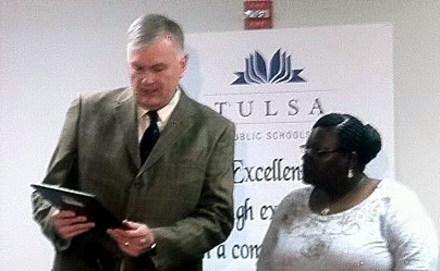 AAA's Neal Krueger presents award to Yolanda Palmer.