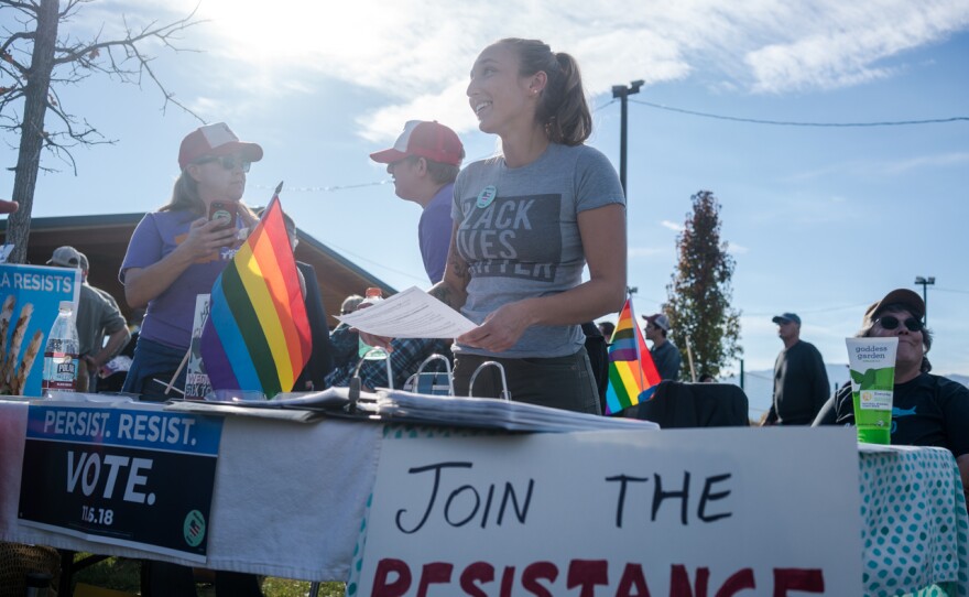Sierra McMurry registers voters during a 'Love Trumps Hate' rally in Missoula, Oct. 18. 2018.