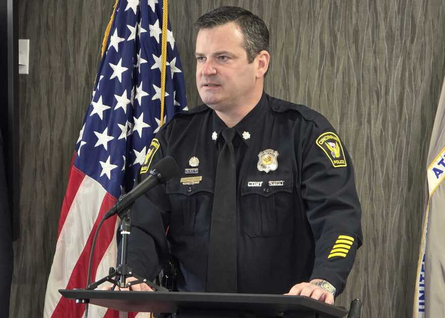 Interim Cincinnati Police Chief Adam Hennie at a press conference in March, 2026.