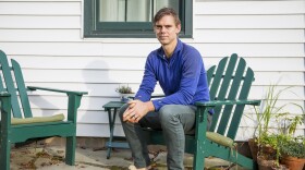 Matt Rooke sits outside of his home in State College, Pennsylvania. A former resident at the Hilltop Mobile Home Park, Rooke said his experience of being displaced gave him insights into the affordable housing problem in the area.