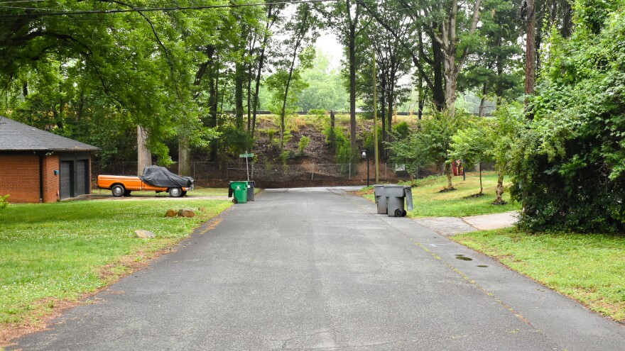 NC DOT cleared trees and limbs in 2024, leaving a clear view of Brookshire Freeway.