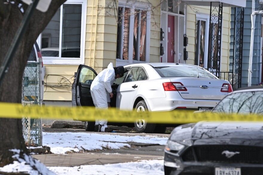 A crime scene investigator is seen outside an apartment house on New Alexander Street, Wilkes-Barre, on Tuesday afternoon, Feb. 24, 2026.