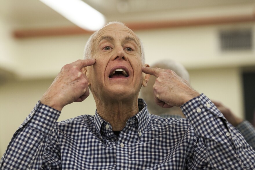 John David, 73, teaches an exercise class to seniors in New York City. His routine goes through every muscle, including those on the face.