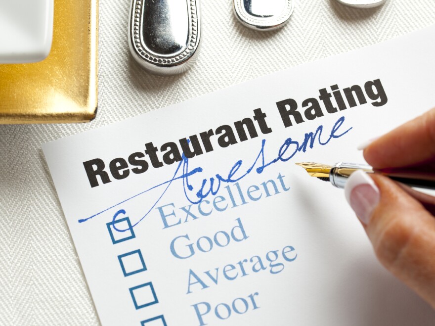 One sign that a restaurant review is a fake is if it gives a very high or very low rating without many specifics.