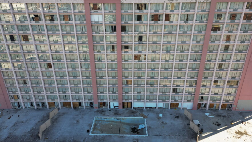 The former Rochester Riverside Hotel at 120 E. Main St. in downtown Rochester, N.Y., has been vacant since closing in early 2020. The property awaits a proposed $61 million redevelopment by local developer Angelo Ingrassia and Ellicott Development that would convert the property into a mixed-use complex with hotel rooms, apartments, retail and restaurant space.