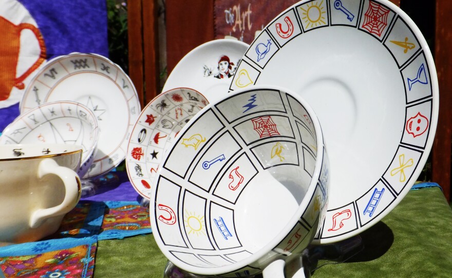 On Canadian tasseomancer Amy Taylor's vintage tea-leaf reading cups, your reading is determined by where your leaves fall on the preprinted symbols on the cups.