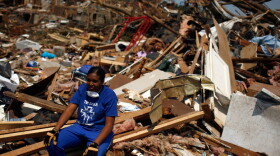 In Tuscaloosa, Ala., on Saturday, LaTia Cobbs sat in the rubble of her destroyed home.