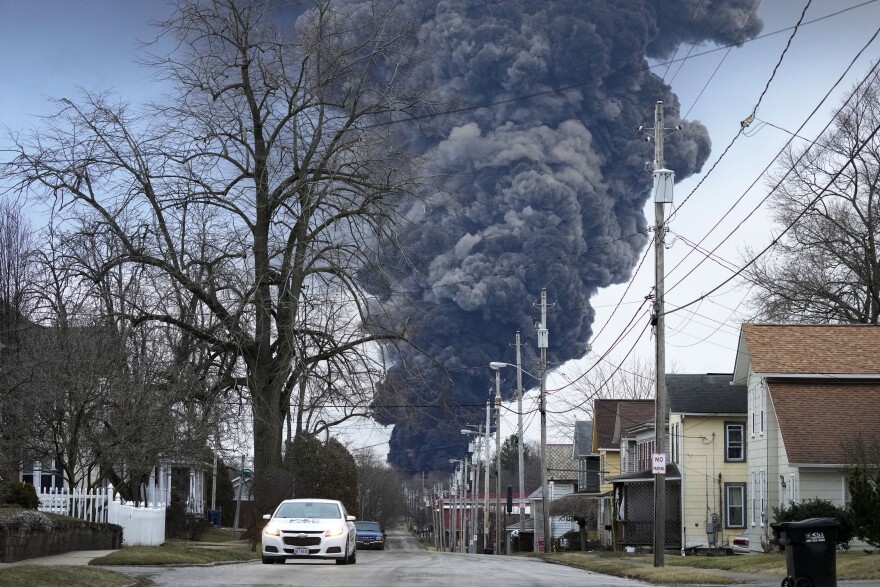 FILE - A black plume rises over East Palestine, Ohio, as a result of a controlled detonation of a portion of the derailed Norfolk Southern trains, on Feb. 6, 2023.