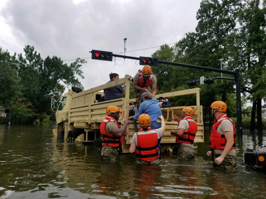 Texas National Guard soldiers conduct rescue operations in flooded areas around Houston, Texas 27 August, 2017. (Photo by 1Lt. Zachary West, 100th MPAD)