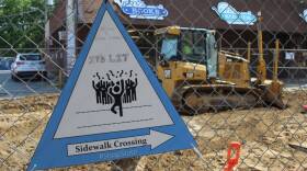 A sign telling pedestrians how to cross construction to access local businesses got some original artwork along West Lafayette's State Street.