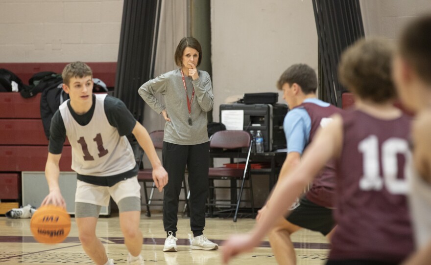 Montrose head coach Tracie McComb watches the boys basketball practice from the sidelines.