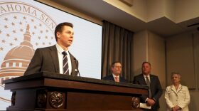 Sen. Adam Pugh, R-Edmond, speaks at a news conference Tuesday while Sen. Chuck Hall, R-Perry, center left, Senate President Pro Tem Lonnie Paxton, R-Tuttle, center right, and Sen. Julie Daniels, R-Bartlesville, right, listen at the state Capitol in Oklahoma City.